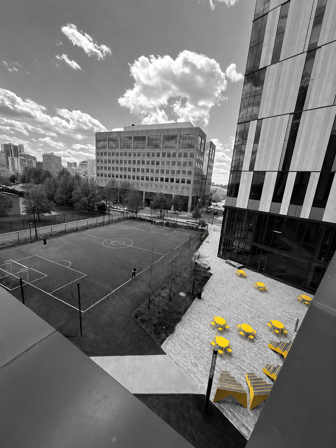 Campus field and outdoor courtyard next to TILT at EF